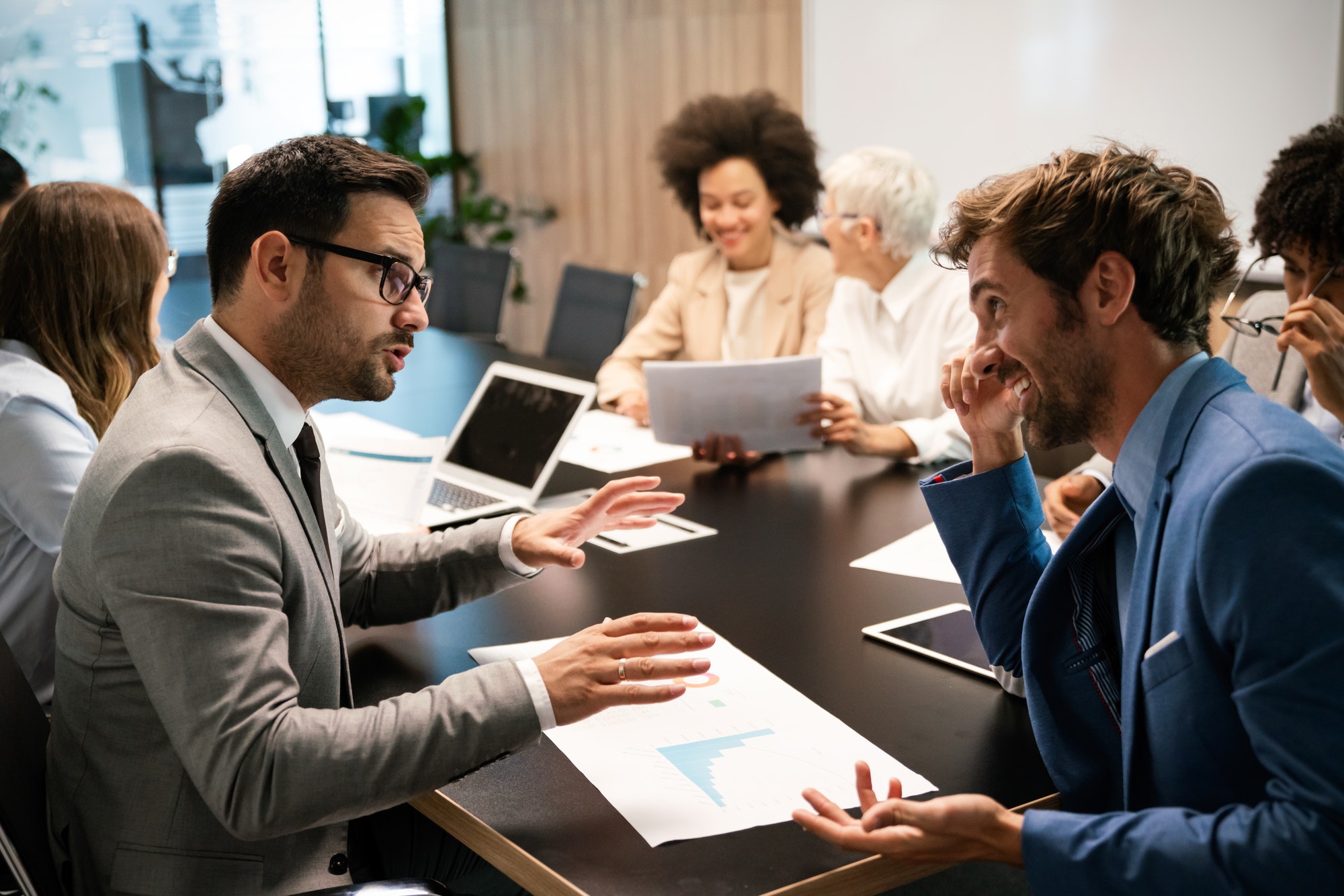 portrait-of-successful-business-team-working-in-office-2.jpg